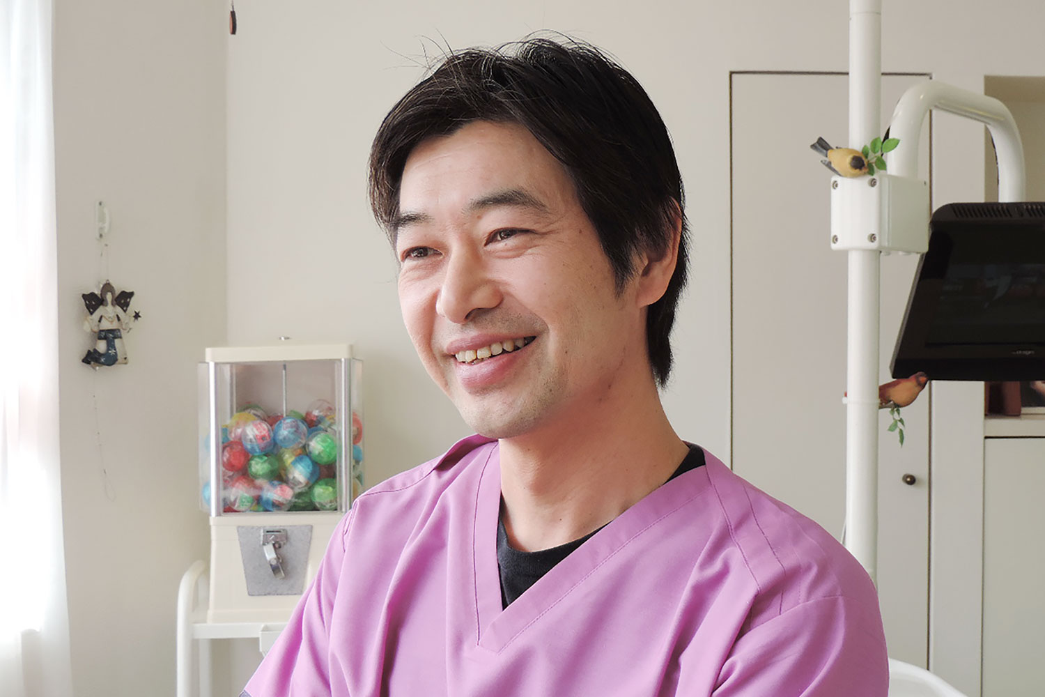 富田 陽一 院長